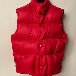 North Face puffer red vest with down filling.